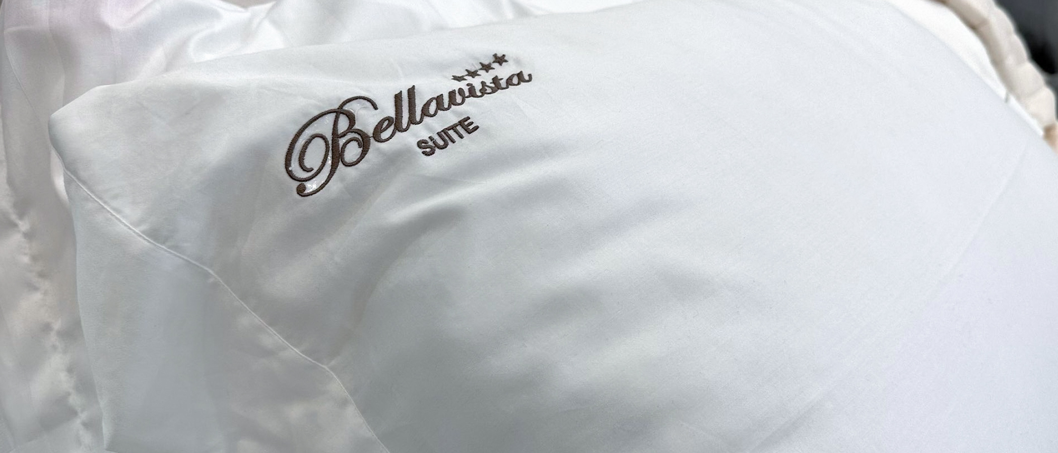 Lenzuola con logo per Bellavista Suite a Monopoli