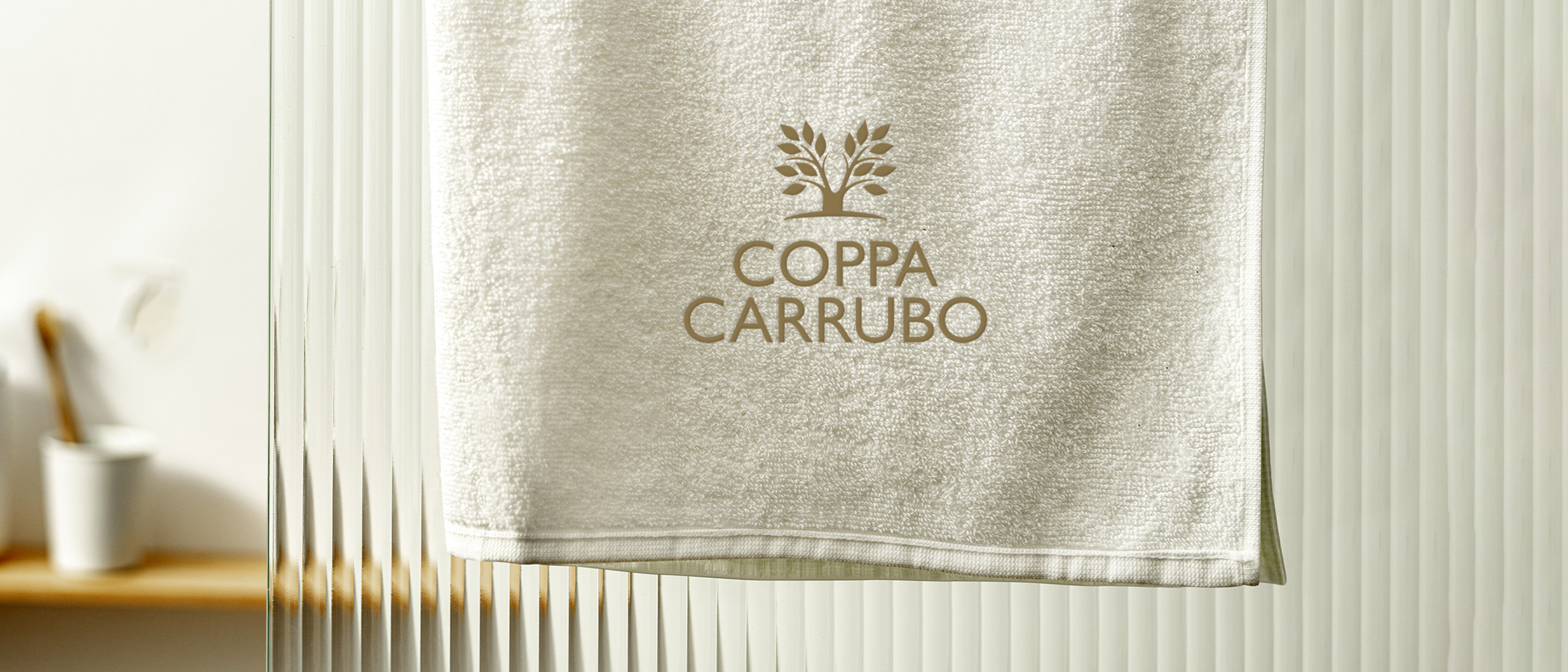 Biancheria con logo per Coppa Carrubo
