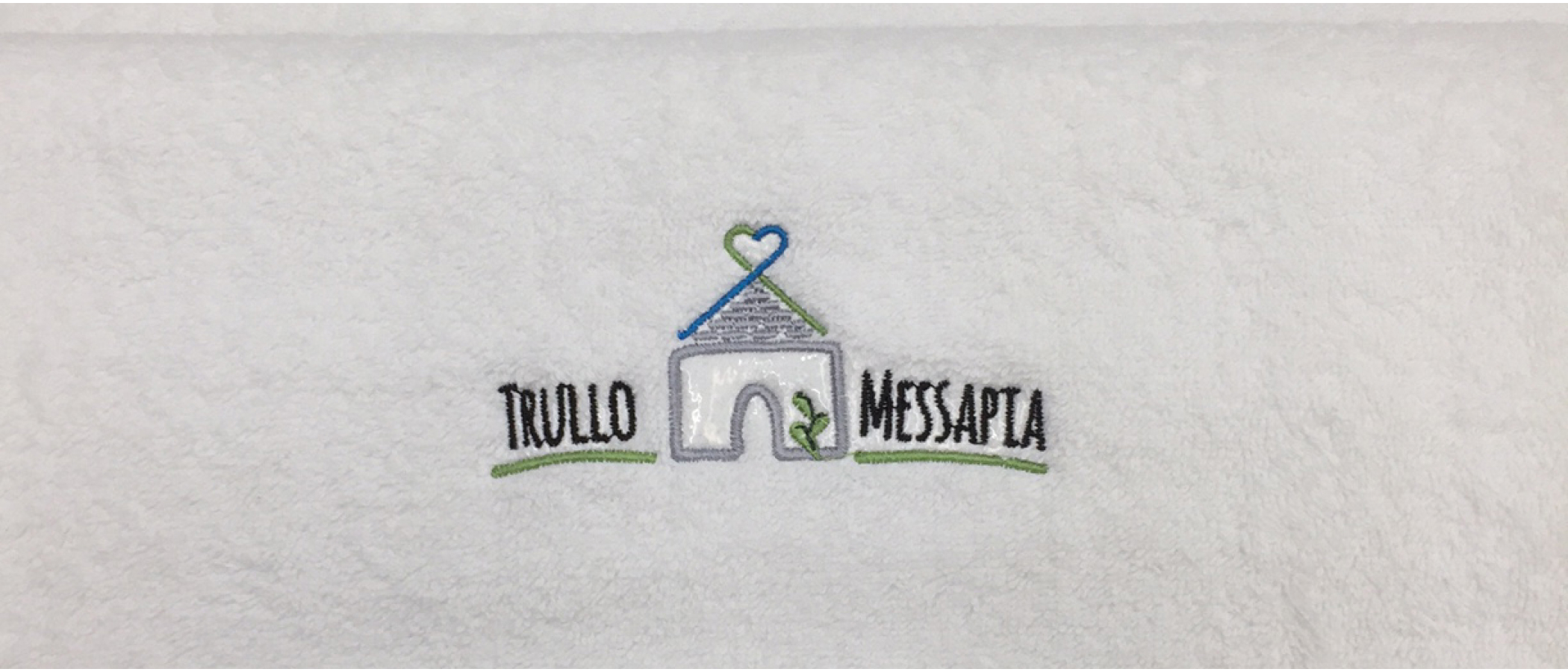 Biancheria da bagno, in spugna 520 grammi, personalizzata con il logo del Trullo Messapia